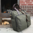 Filson Ballistic Nylon Dryden Briefcase at outdoor fireplace