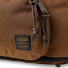 Filson Dryden Duffle Pack Whiskey Bridle Leather pulls