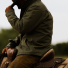 Filson Fleece Lined Jac-Shirt Service Green in the field on a horse 