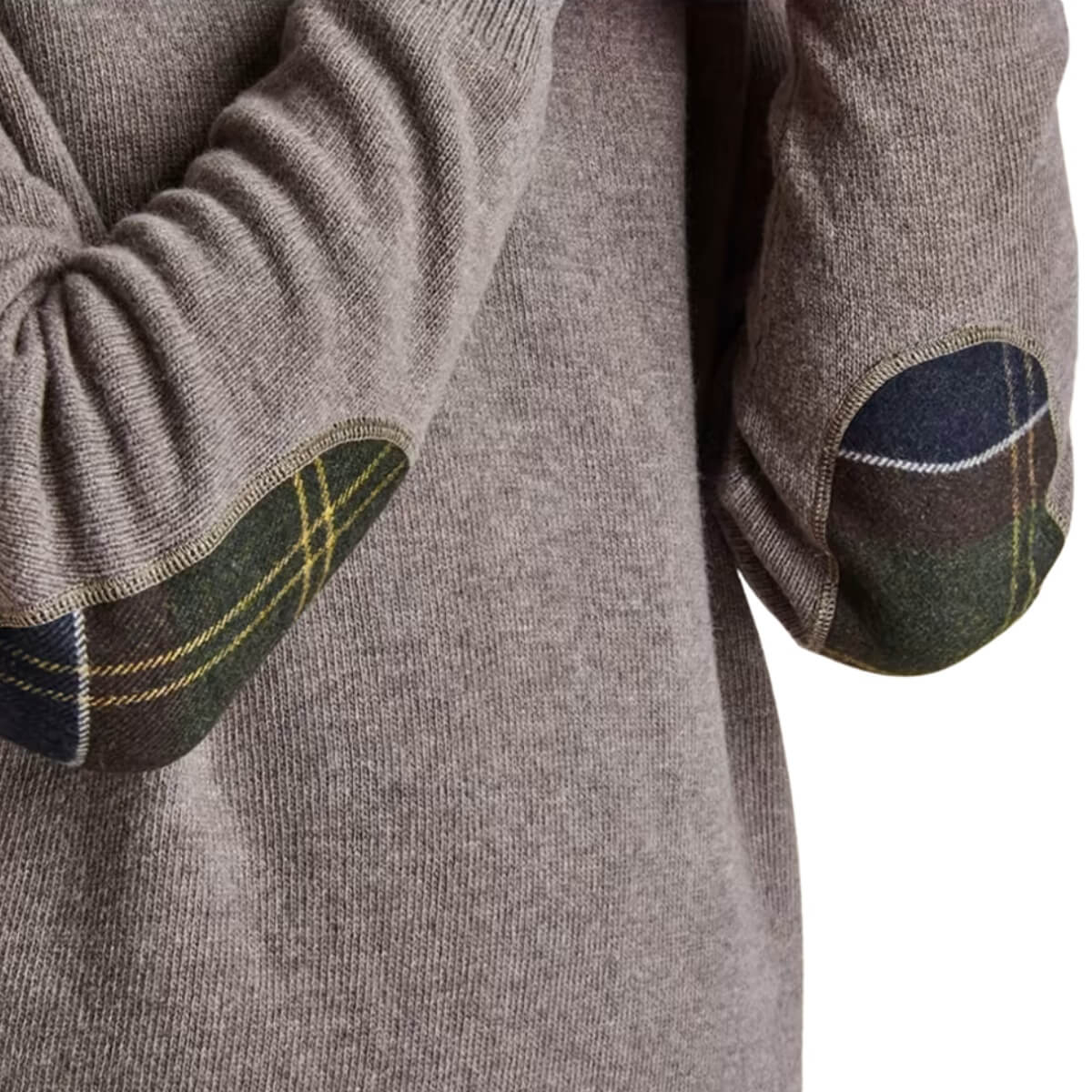 Dieser Barbour Pullover besteht aus 100 % Lammwolle und bietet außergewöhnliche Weichheit und Wärme.