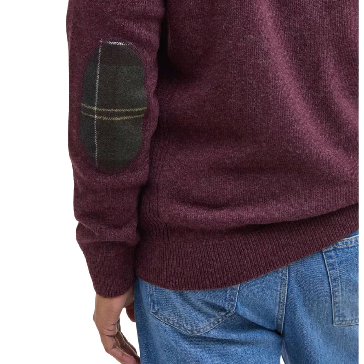Barbour sweater is crafted from 100% lambswool, offering exceptional softness and warmth, classic tartan elbow patches