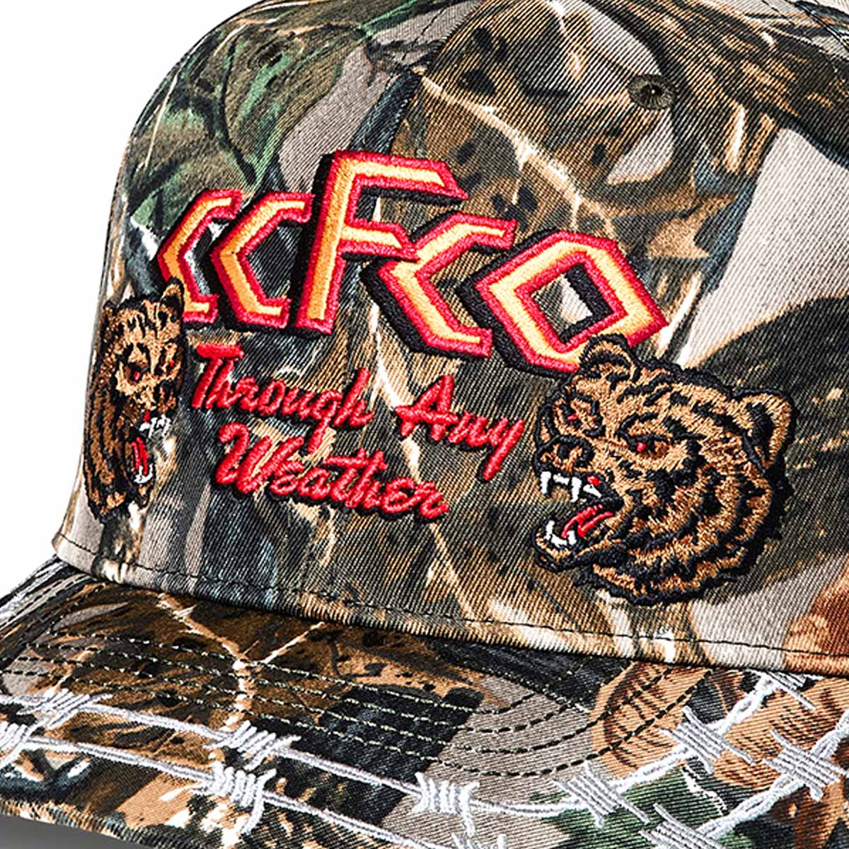 Filson Logger Cap Green Camo/Any Weather, eine klassische Trucker-Cap mit gesticktem Logo-Patch – perfekt für Outdoor und Freizeit