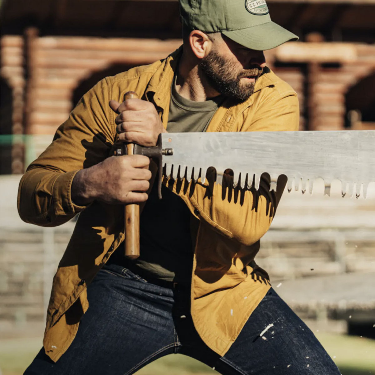 Filson Logger Cap Army Green/Kenai, klassische 6-Panel Kappe, die vor Witterungseinflüssen schützt