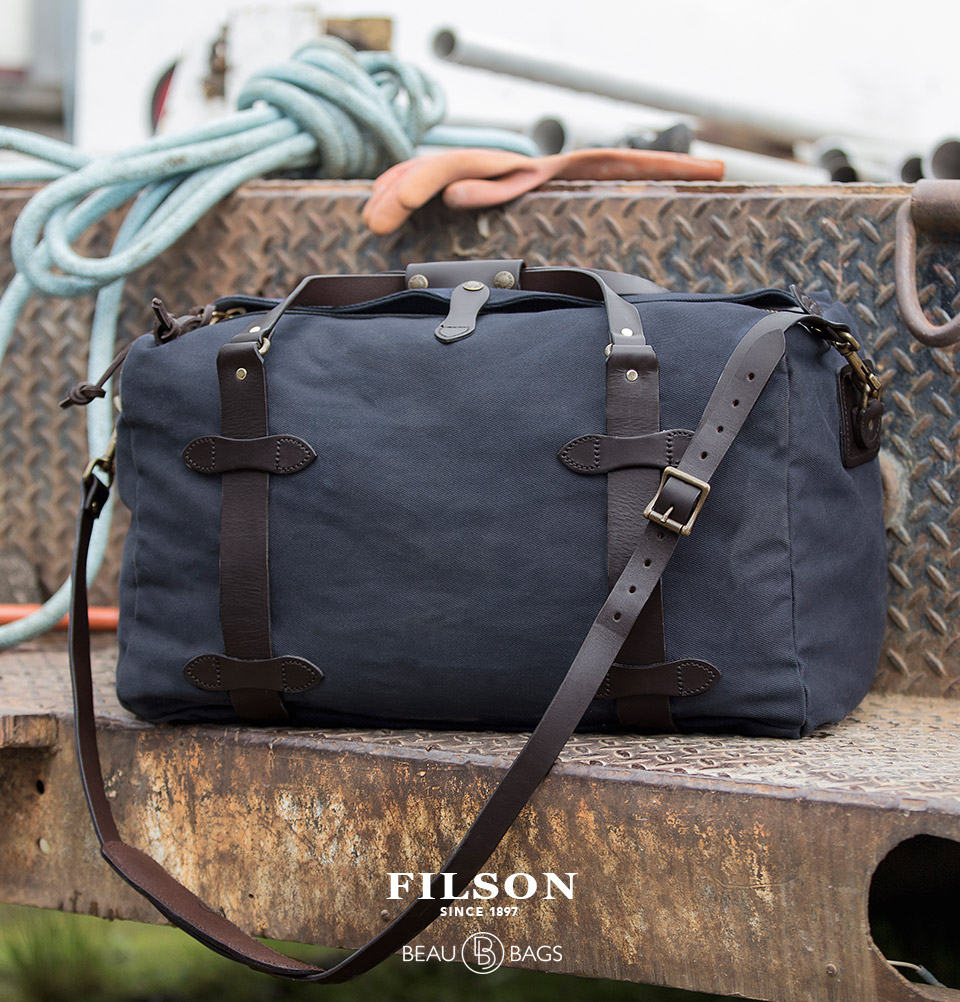 Filson Duffle Medium Navy, reisetasche hergestellt für Schwersteinsätze